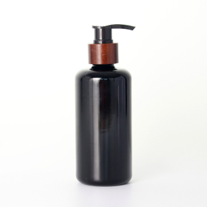 Schwarzglas-Lotion-Pumpflasche mit Holzkragen Großhandel